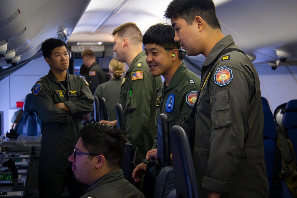 USN Sailors host ROKN sailors on a P-8A flight during RIMPAC 2024