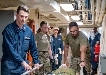 Patient transport during medical training aboard USS Somerset