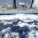 USS Somerset Sailors heave a line alongside Royal Canadian Navy MV Asterix