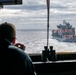 USS Somerset Sailor monitors Royal Canadian Navy MV Asterix