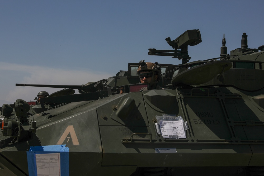 1st LAR Marines load aircraft in preparation for REDEX