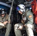 Naval Aircrewmen Review Safety Procedures in Flight During RIMPAC 2024