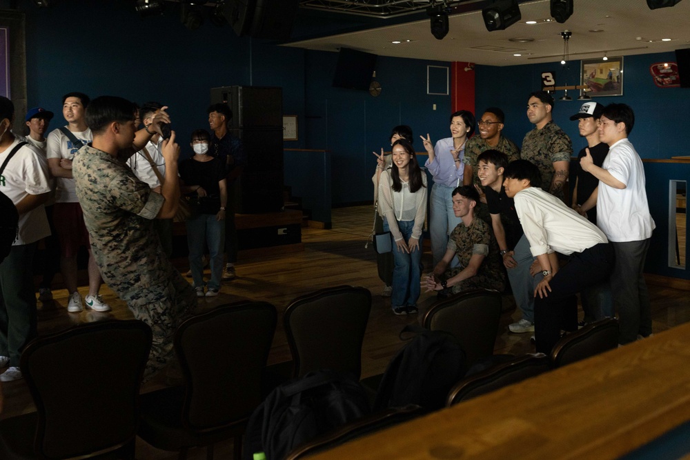 Japanese university students visit Camp Hansen for a tour and culture exchange with III MEF Marines