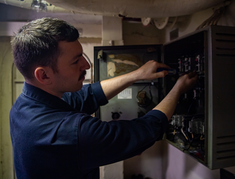 Nimitz Sailor Works On Motor Controller