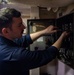 Nimitz Sailor Works On Motor Controller