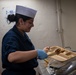 Nimitz Sailor Serves Food