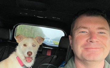 Reserve Citizen Airmen, rescue dog bring joy to community