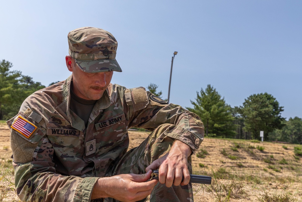 Staff Sgt. Conner Williams loads a magazine