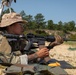 1st Lt. Jessica Romero loads her M4 rifle