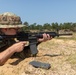 Staff Sgt. Zachary Mills fires an M4 rifle