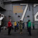Rear Adm. Adan Cruz departs Abraham Lincoln