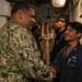 Rear Adm. Adan Cruz greets O’kane Sailors
