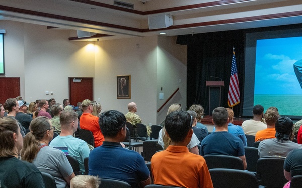 Airmen from the 97th Air Mobility Wing attend Dude Perfect watch party