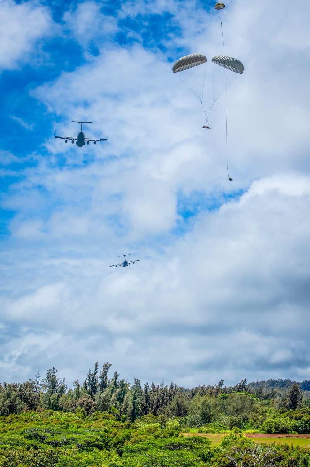 204th and 535th Airlift Squadrons Conduct Airdrop Training