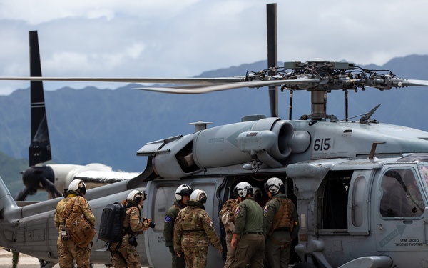 Multinational distinguished visitors travel to the USS Carl Vincent during RIMPAC 2024