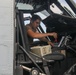 Sailors aboard the USS Howard conduct routine maintenance on a Sea Hawk helicopter in the South China Sea