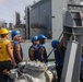 Sailors aboard the USS Howard conduct a replenishment-at-sea with the USNS Cesar Chavez in the South China Sea