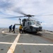 Sailors aboard the USS Howard conduct flight quarters in the South China Sea