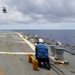 Sailors aboard the USS Howard conduct flight quarters in the South China Sea