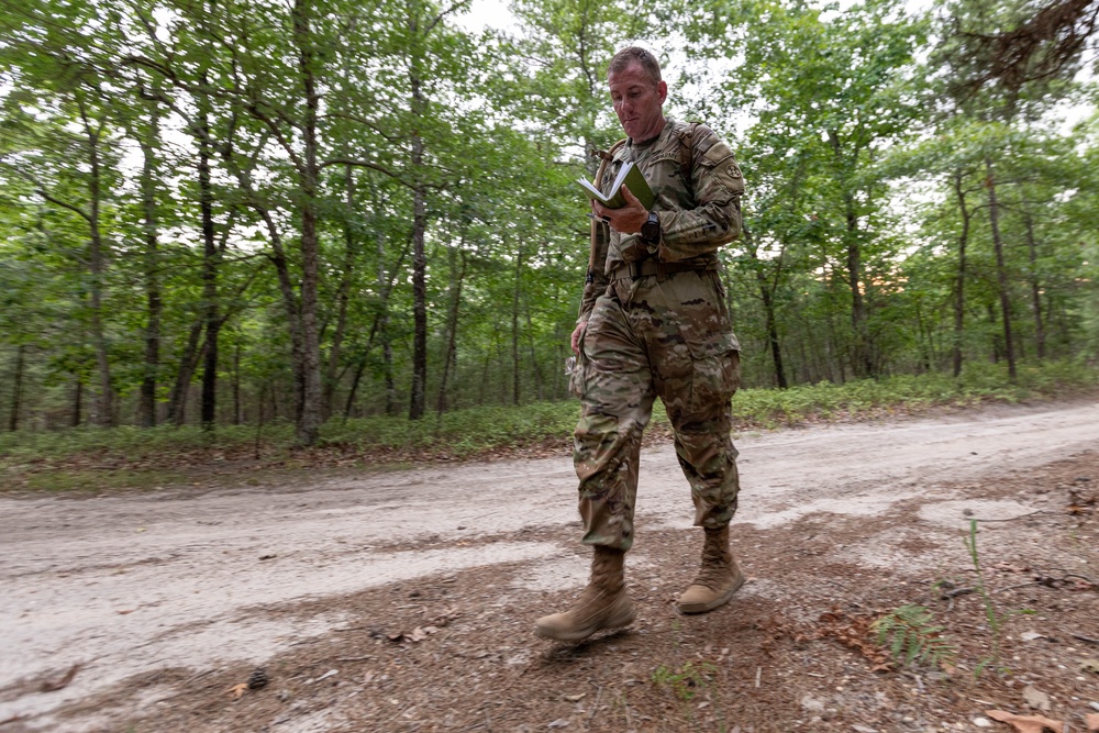 Capt. Zachary Grimes checks his notes