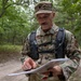 Lt. Col. Thomas Sebastiani checks his map