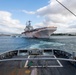 USNS Grasp tows USS Tarawa out to sea for SINKEX