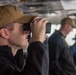 USS Ronald Reagan (CVN 76) Sailors stand watch in the pilot house