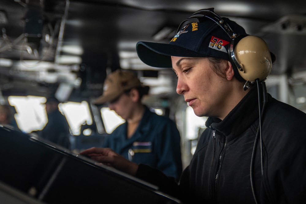 USS Ronald Reagan (CVN 76) Sailors stand watch in the pilot house