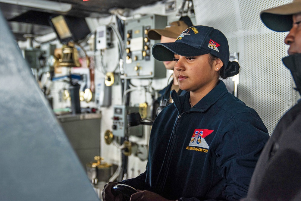 USS Ronald Reagan (CVN 76) Sailors stand watch in the pilot house