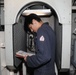 Sailors aboard the USS Howard conduct an engineering training team drill in the South China Sea