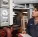 Sailors aboard the USS Howard conduct an engineering training team drill in the South China Sea