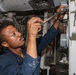 Sailors aboard the USS Howard conduct an engineering training team drill in the South China Sea