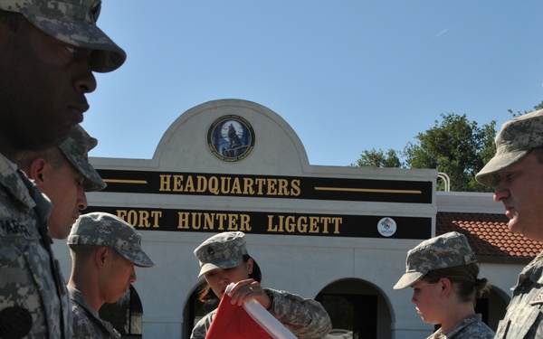 Soldiers folding flag