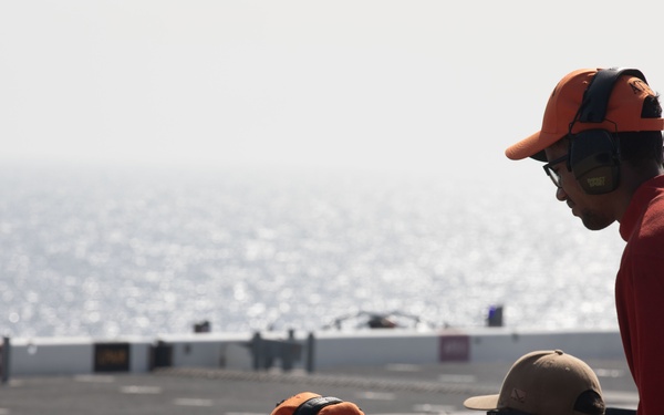 Sailors Conduct a Small Arms Gun Shoot for Weapon Qualifications Aboard the USS Puller