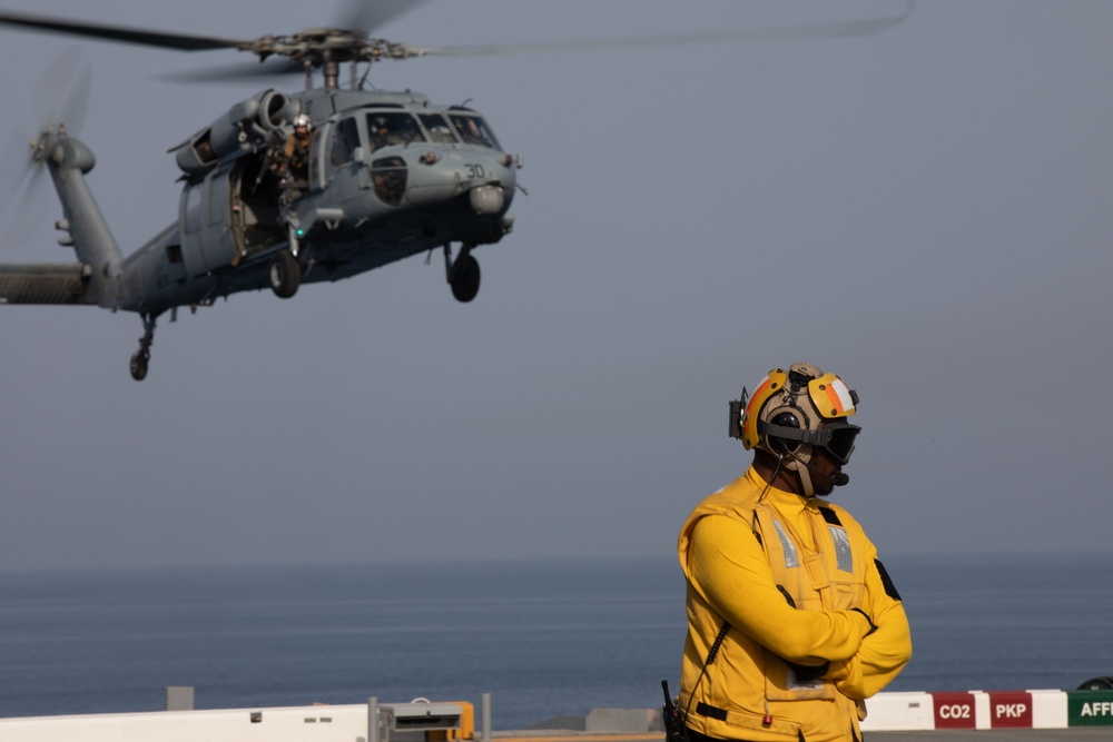 USS Lewis B. Puller Conducts a Supply Transportation Drill with HSC-26