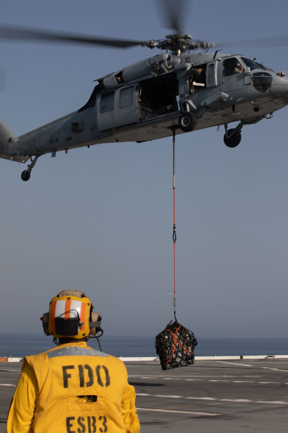 USS Lewis B. Puller Conducts a Supply Transportation Drill with HSC-26