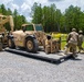 356th Quartermaster Company loads forklift after logistical support