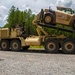 356th Quartermaster Company loads forklift after logistical support