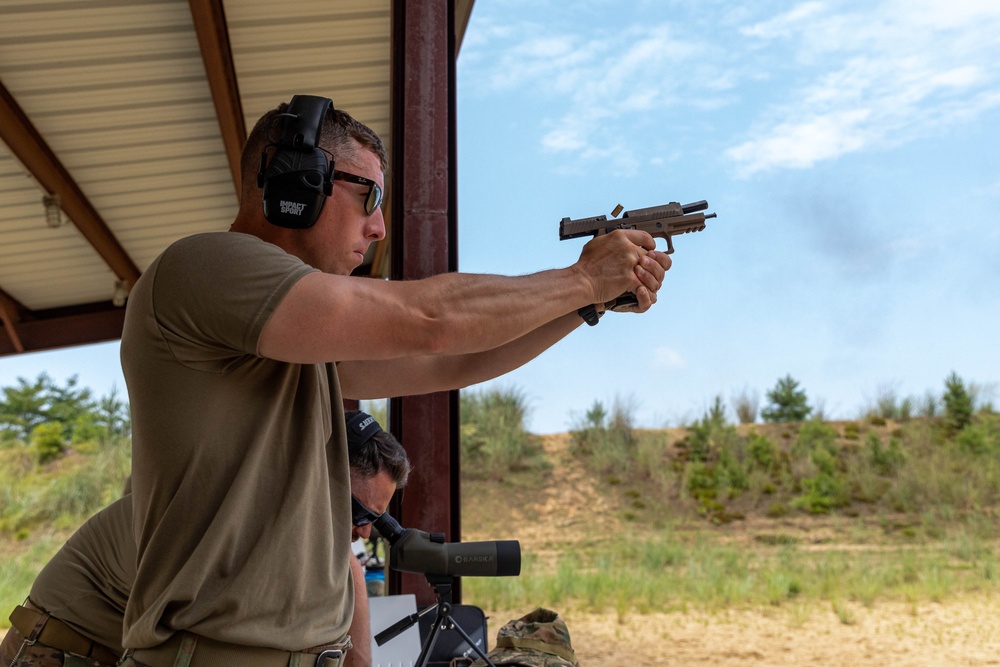1st Lt. Layton Thorpe fires an M17 pistol