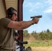 1st Lt. Layton Thorpe fires an M17 pistol