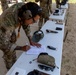 1st Lt. Jessica Romero takes notes