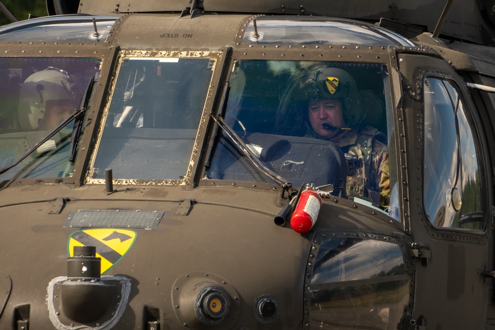 1st Cavalry Division Black Hawk Flight Celebrates Reenlistments and Trains Pilot