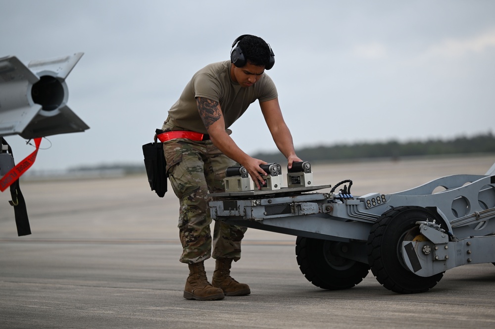 60th FS conducts weapons load at Eglin AFB