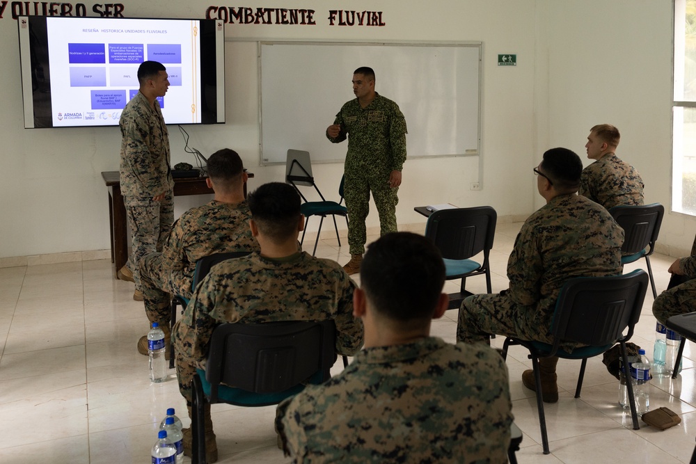 U.S. Marines with Littoral Craft Company Charlie attend classroom lecture during the Colombian Fluvial Operations Course