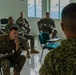 U.S. Marines with Littoral Craft Company Charlie attend classroom lecture during the Colombian Fluvial Operations Course