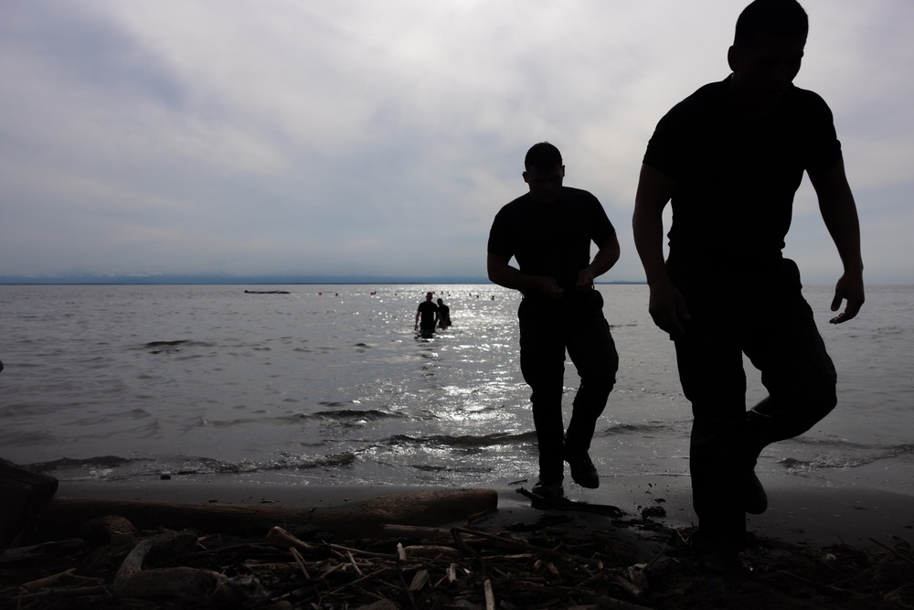 U.S. Marines participate in swim qualification during the Colombian Fluvial Operations Course.