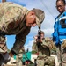 Staff Sergeant Richard Rodruiguez triages a patient during a Mass Casualty Drill