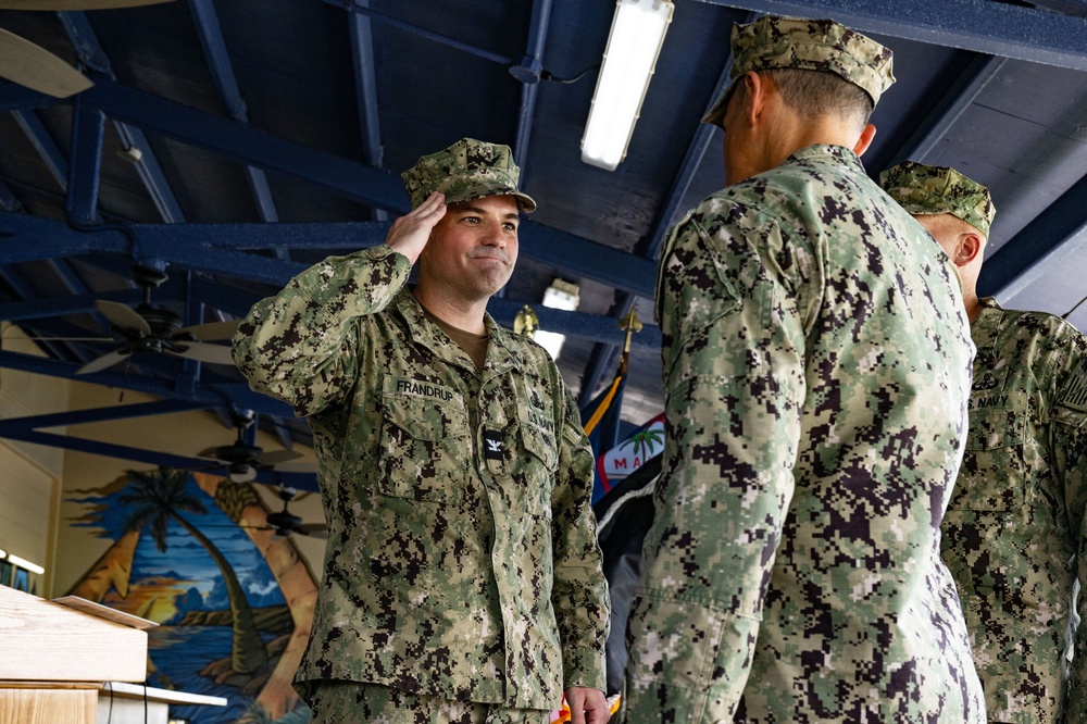 Capt. Erich Frandrup Salutes Commodore Shaun Lieb During Change of Command at CTF 75