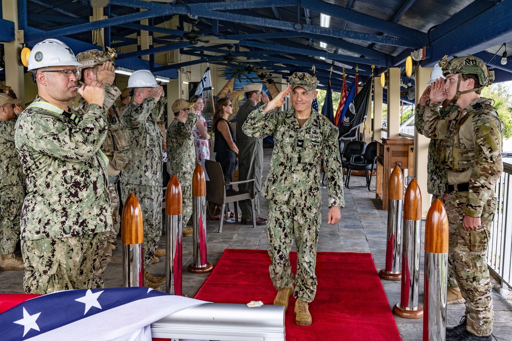 Capt. Shaun Lieb shares a final salute as he departs from CTF 75