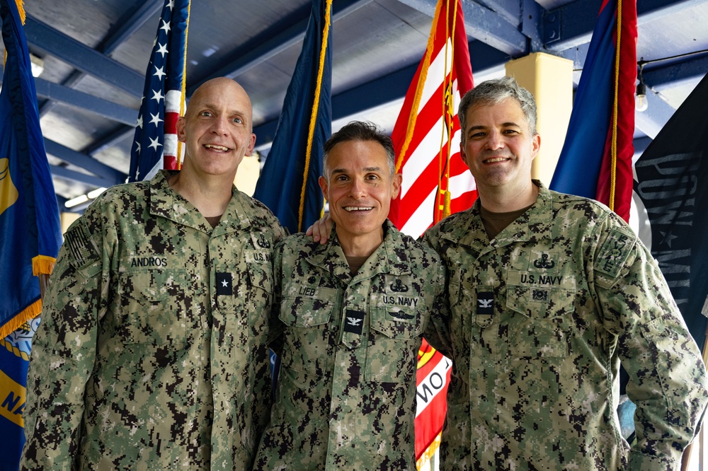 From left to right: Rear Adm. Bradley J. Andros, Capt. Shaun T. Lieb, and Capt. Erich C. Frandrup